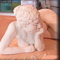 Thought - Sculpture by Ed Hamilton in unfired clay